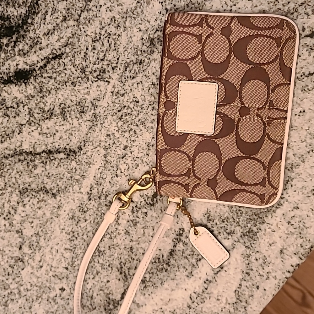 Coach wristlet with with strap